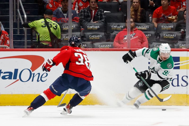 Oct 17, 2024; Washington, District of Columbia, USA; Dallas Stars center Matt Duchene (95) skates with the puck as Washington Capitals defenseman Rasmus Sandin (38) defends in the second period at Capital One Arena. Mandatory Credit: Geoff Burke-Imagn Images