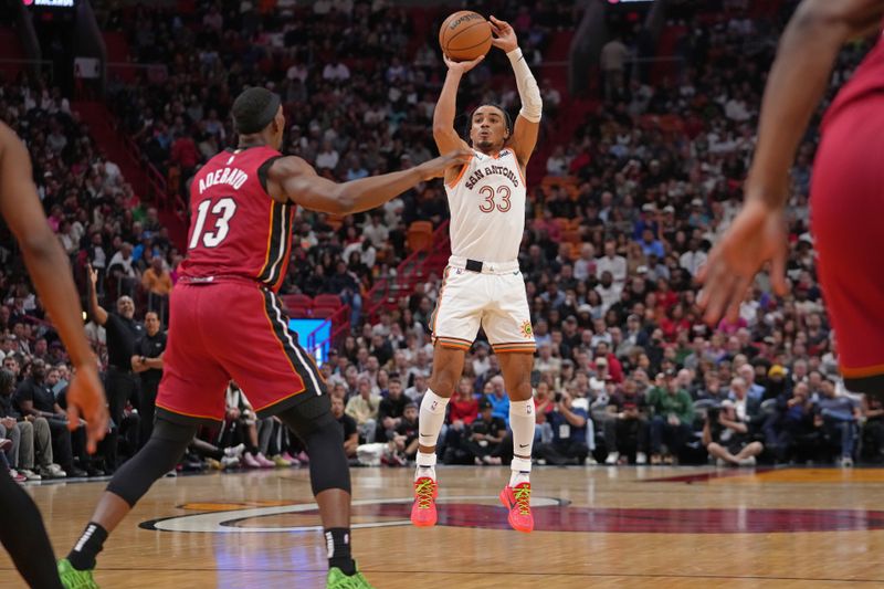 MIAMI, FL - FEBRUARY 7: Tre Jones #33 of the San Antonio Spurs shoots the ball during the game against the Miami Heat on February 7, 2024 at Kaseya Center in Miami, Florida. NOTE TO USER: User expressly acknowledges and agrees that, by downloading and or using this Photograph, user is consenting to the terms and conditions of the Getty Images License Agreement. Mandatory Copyright Notice: Copyright 2024 NBAE (Photo by Eric Espada/NBAE via Getty Images)