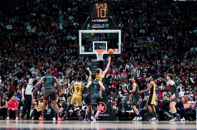 TORONTO, ON - APRIL 7: Kelly Olynyk #41 of the Toronto Raptors goes to the basket against the Washington Wizards during the second half of their basketball game at the Scotiabank Arena on April 7, 2024 in Toronto, Ontario, Canada. NOTE TO USER: User expressly acknowledges and agrees that, by downloading and/or using this Photograph, user is consenting to the terms and conditions of the Getty Images License Agreement. (Photo by Mark Blinch/Getty Images)