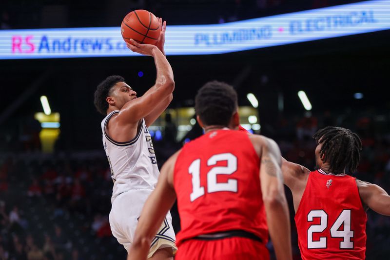 Feb 25, 2023; Atlanta, Georgia, USA; Georgia Tech Yellow Jackets guard Dallan Coleman (3) shoots over Louisville Cardinals forward JJ Traynor (12) and forward Jae'Lyn Withers (24) in the second half at McCamish Pavilion. Mandatory Credit: Brett Davis-USA TODAY Sports