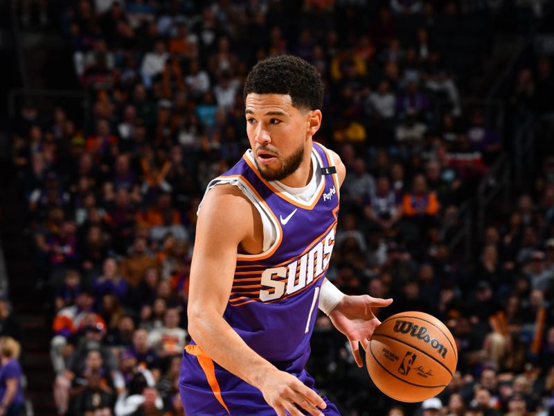 PHOENIX, AZ - NOVEMBER 2: Devin Booker #1 of the Phoenix Suns dribbles the ball during the game against the Portland Trail Blazers on November 2, 2024 at Footprint Center in Phoenix, Arizona. NOTE TO USER: User expressly acknowledges and agrees that, by downloading and or using this photograph, user is consenting to the terms and conditions of the Getty Images License Agreement. Mandatory Copyright Notice: Copyright 2024 NBAE (Photo by Barry Gossage/NBAE via Getty Images)