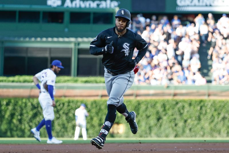 Jun 5, 2024; Chicago, Illinois, USA; Chicago White Sox outfielder Corey Julks (30) rounds the bases after hitting a solo home run against the Chicago Cubs during the first inning at Wrigley Field. Mandatory Credit: Kamil Krzaczynski-USA TODAY Sports