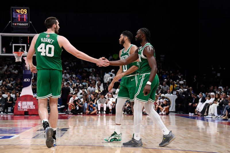 ABU DHABI, UAE - OCTOBER 6: Luke Kornet #40 and Jaylen Brown #7 of the Boston Celtics high five during the game against the Denver Nuggets during the 2024 Global Games on October 6, 2024 at the Etihad Arena in Abu Dhabi, United Arab Emirates. NOTE TO USER: User expressly acknowledges and agrees that, by downloading and/or using this Photograph, user is consenting to the terms and conditions of the Getty Images License Agreement. Mandatory Copyright Notice: Copyright 2024 NBAE (Photo by Brian Babineau/NBAE via Getty Images)