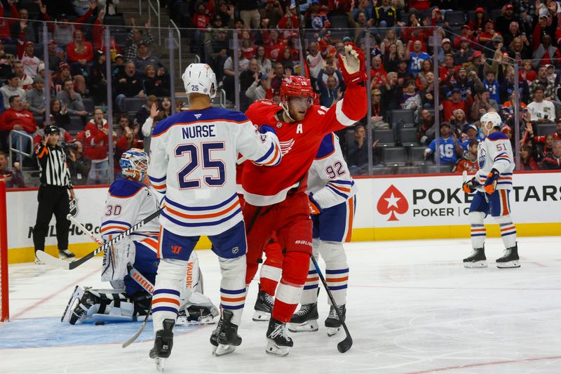 Oct 27, 2024; Detroit, Michigan, USA; Detroit Red Wings center Andrew Copp (18) celebrates a goal scored in the second period against the Edmonton Oilers at Little Caesars Arena. Mandatory Credit: Brian Bradshaw Sevald-Imagn Images