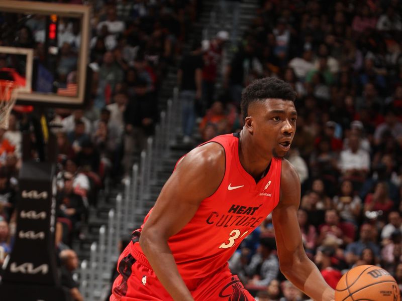 MIAMI, FL - DECEMBER 8: Thomas Bryant #31 of the Miami Heat dribbles the ball during the game against the Cleveland Cavaliers on December 8, 2024 at Kaseya Center in Miami, Florida. NOTE TO USER: User expressly acknowledges and agrees that, by downloading and or using this Photograph, user is consenting to the terms and conditions of the Getty Images License Agreement. Mandatory Copyright Notice: Copyright 2024 NBAE (Photo by Issac Baldizon/NBAE via Getty Images)