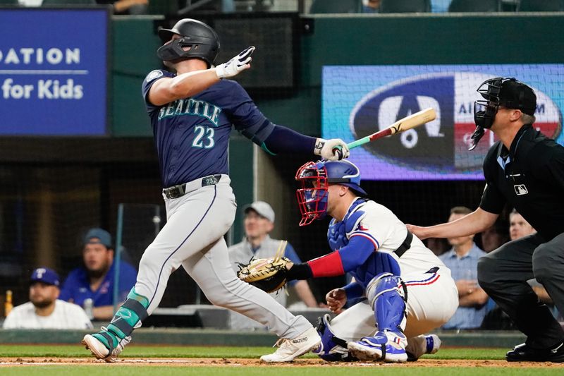 Apr 25, 2024; Arlington, Texas, USA; Seattle Mariners first baseman Ty France (23) follows through on a two-run home run during the first inning against the Texas Rangers at Globe Life Field. Mandatory Credit: Raymond Carlin III-USA TODAY Sports