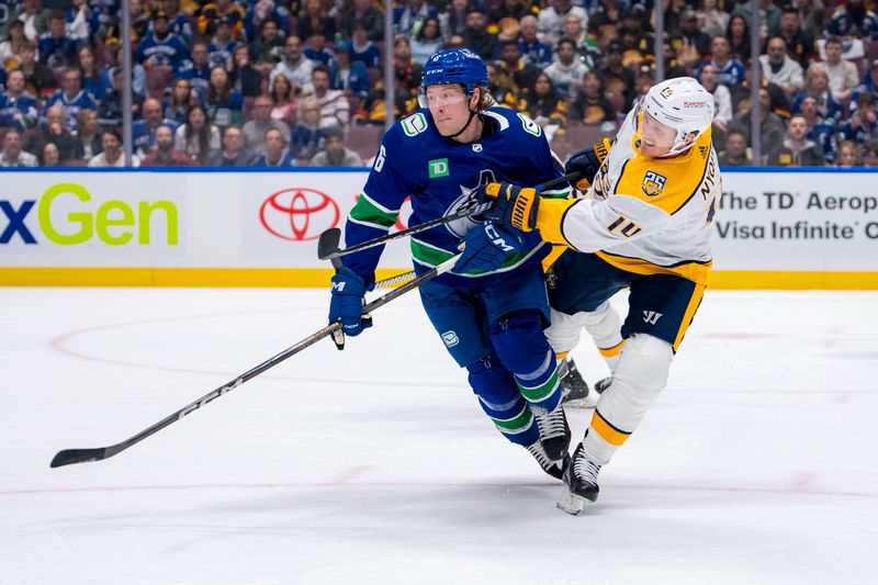 Apr 21, 2024; Vancouver, British Columbia, CAN; Vancouver Canucks forward Brock Boeser (6) checks Nashville Predators forward Gustav Nyquist (14) in the first period in game one of the first round of the 2024 Stanley Cup Playoffs at Rogers Arena. Mandatory Credit: Bob Frid-USA TODAY Sports