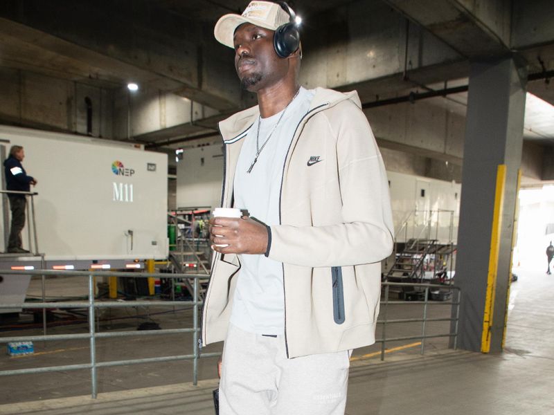 PORTLAND, OR - MARCH 13:  Duop Reath #26 of the Portland Trail Blazers arrives to the arena before the game on March 13, 2024 at the Moda Center Arena in Portland, Oregon. NOTE TO USER: User expressly acknowledges and agrees that, by downloading and or using this photograph, user is consenting to the terms and conditions of the Getty Images License Agreement. Mandatory Copyright Notice: Copyright 2024 NBAE (Photo by Cameron Browne/NBAE via Getty Images)