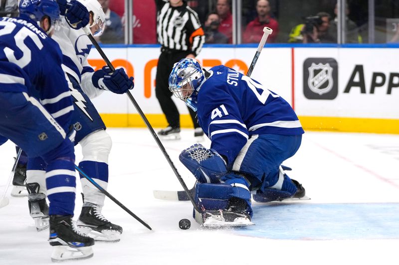 Oct 21, 2024; Toronto, Ontario, CAN; Toronto Maple Leafs goaltender Anthony Stolarz (41) makes a save against the Tampa Bay Lightning during the second period at Scotiabank Arena. Mandatory Credit: John E. Sokolowski-Imagn Images