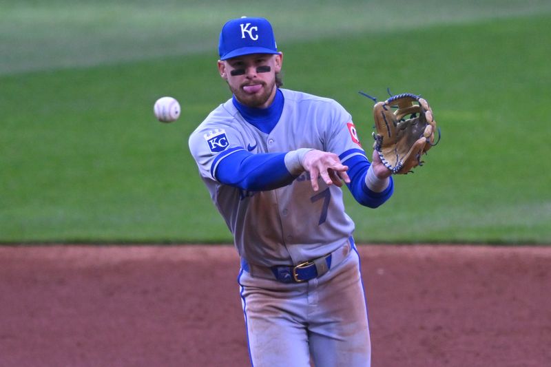 Apr 12, 2025; Cleveland, Ohio, USA; Kansas City Royals shortstop Bobby Witt Jr. (7) throws to first base in the third inning against the Cleveland Guardians at Progressive Field. Mandatory Credit: David Richard-Imagn Images