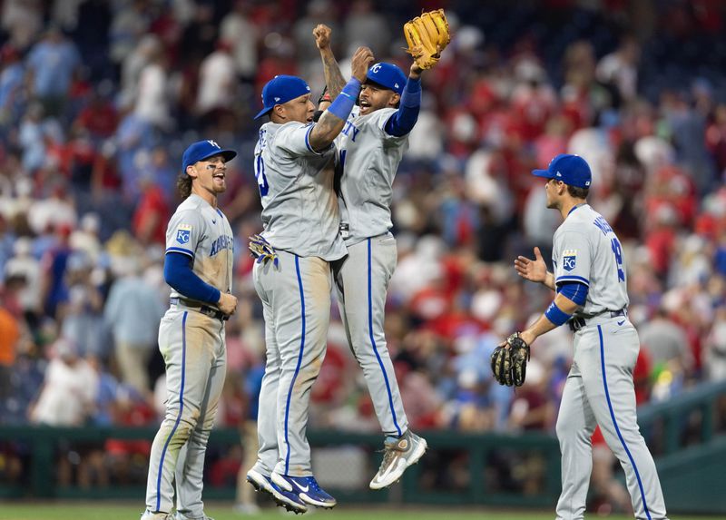 Aug 4, 2023; Philadelphia, Pennsylvania, USA; Kansas City Royals catcher Salvador Perez (13) and third baseman Maikel Garcia (11) celebrate a victory against the Philadelphia Phillies at Citizens Bank Park. Mandatory Credit: Bill Streicher-USA TODAY Sports