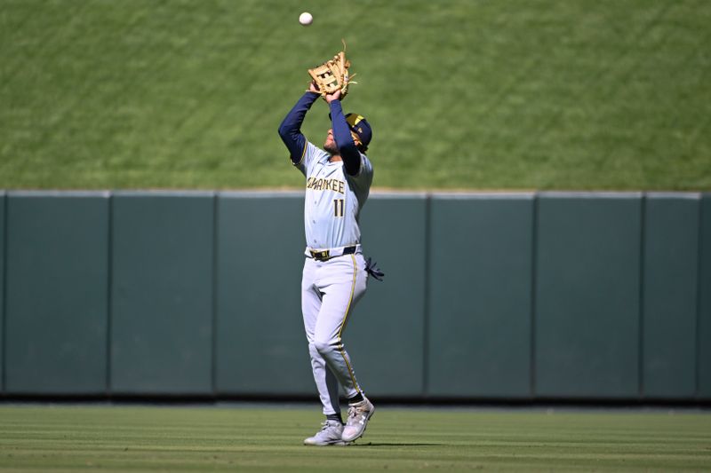 Apr 21, 2024; St. Louis, Missouri, USA; Milwaukee Brewers right fielder Jackson Chourio (11) catches a fly ball by the St. Louis Cardinals in the eighth inning at Busch Stadium. Mandatory Credit: Joe Puetz-USA TODAY Sports