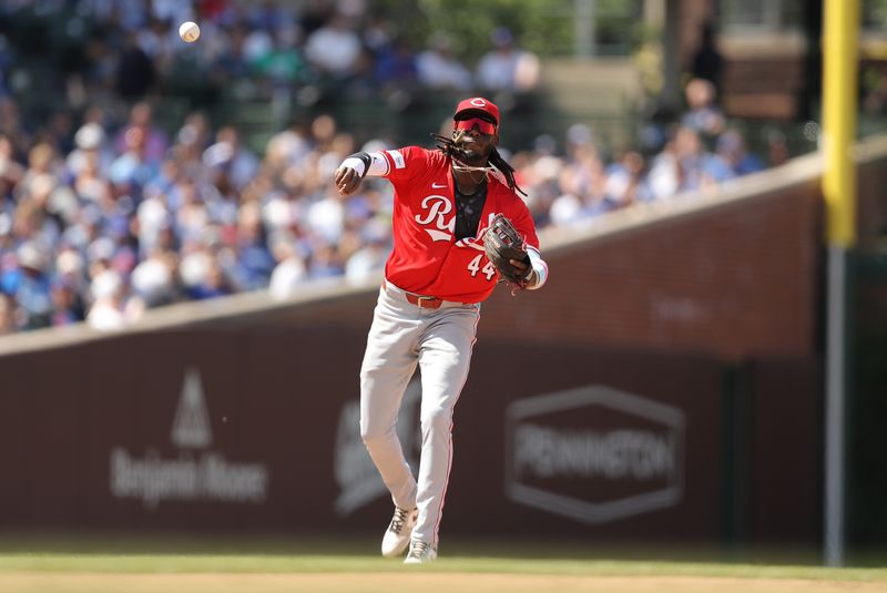 May 31, 2024; Chicago, Illinois, USA; Cincinnati Reds shortstop Elly De La Cruz (44) throws the ball to first base for an out during the sixth inning against the Cincinnati Reds at Wrigley Field. Mandatory Credit: Melissa Tamez-USA TODAY Sports