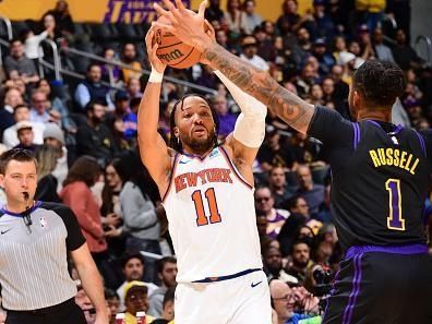 LOS ANGELES, CA - DECEMBER 18:  Jalen Brunson #11 of the New York Knicks handles the ball during the game  on December 18, 2023 at Crypto.Com Arena in Los Angeles, California. NOTE TO USER: User expressly acknowledges and agrees that, by downloading and/or using this Photograph, user is consenting to the terms and conditions of the Getty Images License Agreement. Mandatory Copyright Notice: Copyright 2023 NBAE (Photo by Adam Pantozzi/NBAE via Getty Images)