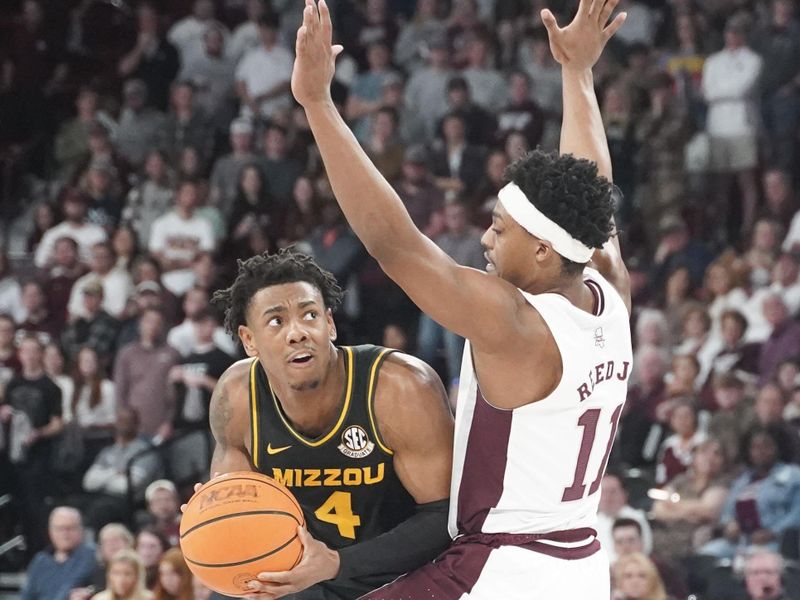 Feb 4, 2023; Starkville, Mississippi, USA; Missouri Tigers guard DeAndre Gholston (4) fights for position against Mississippi State Bulldogs guard Eric Reed Jr. (11) during second half at Humphrey Coliseum. Mandatory Credit: Matt Bush-USA TODAY Sports