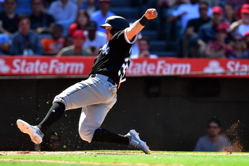 Jun 29, 2023; Anaheim, California, USA; Chicago White Sox first baseman Andrew Vaughn (25) scores a run against the Los Angeles Angels during the ninth inning at Angel Stadium. Mandatory Credit: Gary A. Vasquez-USA TODAY Sports