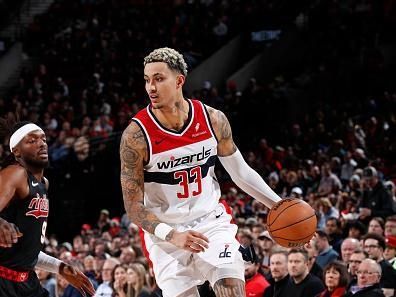 PORTLAND, OR - DECEMBER 21: Kyle Kuzma #33 of the Washington Wizards handles the ball during the game against the Portland Trail Blazers on December 21, 2023 at the Moda Center Arena in Portland, Oregon. NOTE TO USER: User expressly acknowledges and agrees that, by downloading and or using this photograph, user is consenting to the terms and conditions of the Getty Images License Agreement. Mandatory Copyright Notice: Copyright 2023 NBAE (Photo by Cameron Browne/NBAE via Getty Images)