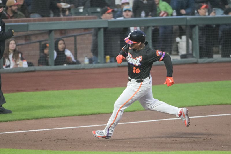 Jun 24, 2025; San Francisco, California, USA;  San Francisco Giants designated hitter Rafael Devers (16) rounds third base on his way home during the sixth inning of the game against the Miami Marlins at Oracle Park. Mandatory Credit: Ed Szczepanski-Imagn Images