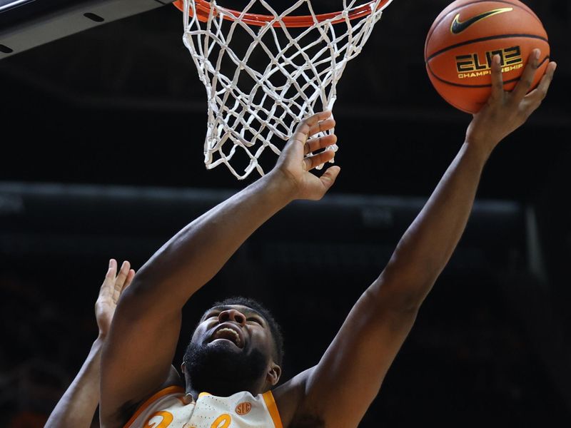 Jan 13, 2026; Knoxville, Tennessee, USA;  Tennessee Volunteers forward Jaylen Carey (23) drives to the basket against the Texas A&M Aggies during the first half at Thompson-Boling Arena at Food City Center. Mandatory Credit: Randy Sartin-Imagn Images