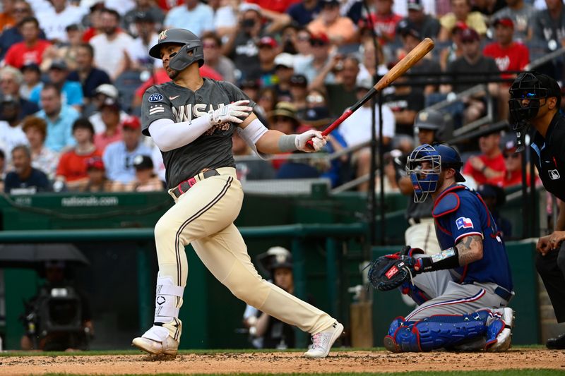 Jul 8, 2023; Washington, District of Columbia, USA; Washington Nationals first baseman Joey Meneses (45) doubles against the Texas Rangers during the second inning at Nationals Park. Mandatory Credit: Brad Mills-USA TODAY Sports