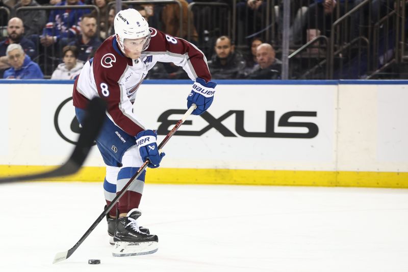 Jan 26, 2025; New York, New York, USA;  Colorado Avalanche defenseman Cale Makar (8) attempts a shot on goal in the first period against the New York Rangers at Madison Square Garden. Mandatory Credit: Wendell Cruz-Imagn Images