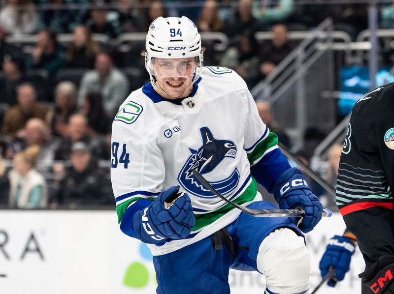 Dec 29, 2025; Seattle, Washington, USA; Vancouver Canucks forward Linus Karlsson (94) celebrates after scoring a goal during the first period against the Seattle Kraken at Climate Pledge Arena. Mandatory Credit: Stephen Brashear-Imagn Images