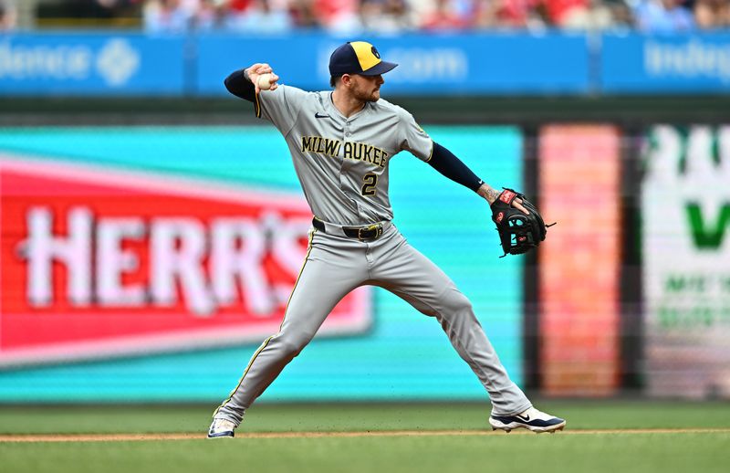 Jun 5, 2024; Philadelphia, Pennsylvania, USA; Milwaukee Brewers infielder Brice Turang (2) throws to first base against the Philadelphia Phillies in the second inning at Citizens Bank Park. Mandatory Credit: Kyle Ross-USA TODAY Sports