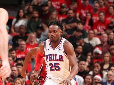 MIAMI, FL - DECEMBER 25:  Danuel House Jr. #25 of the Philadelphia 76ers handles the ball during the game  on December 25, 2023 at Kaseya Center Arena in Miami, Florida. NOTE TO USER: User expressly acknowledges and agrees that, by downloading and or using this Photograph, user is consenting to the terms and conditions of the Getty Images License Agreement. Mandatory Copyright Notice: Copyright 2023 NBAE (Photo by Issac Baldizon/NBAE via Getty Images)