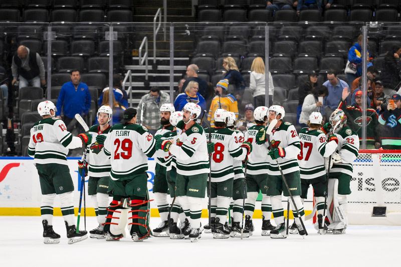 Nov 19, 2024; St. Louis, Missouri, USA;  Minnesota Wild celebrate after defeating the St. Louis Blues at Enterprise Center. Mandatory Credit: Jeff Curry-Imagn Images