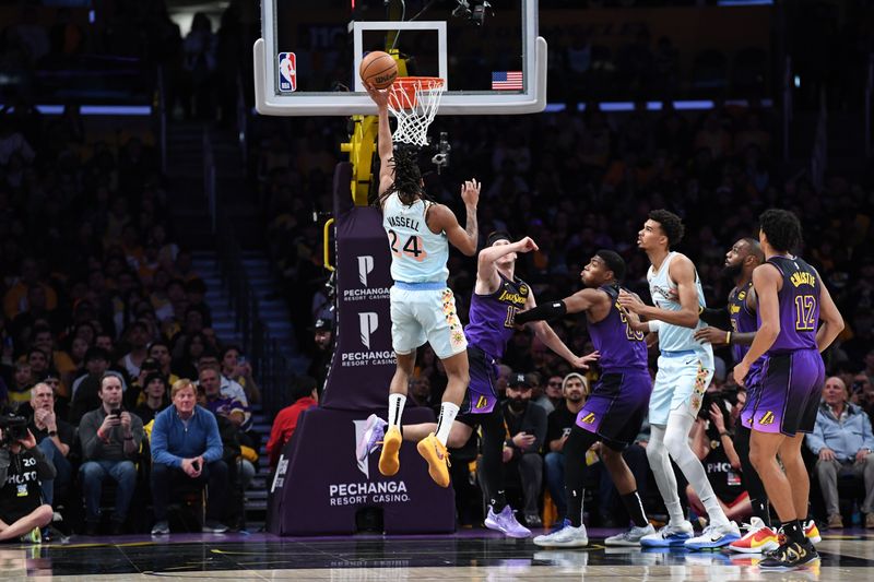 LOS ANGELES, CA - JANUARY 13: Devin Vassell #24 of the San Antonio Spurs drives to the basket during the game against the Los Angeles Lakers on January 13, 2025 at Crypto.Com Arena in Los Angeles, California. NOTE TO USER: User expressly acknowledges and agrees that, by downloading and/or using this Photograph, user is consenting to the terms and conditions of the Getty Images License Agreement. Mandatory Copyright Notice: Copyright 2025 NBAE (Photo by Noah Graham/NBAE via Getty Images)