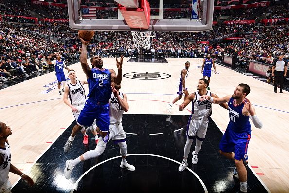 LOS ANGELES, CA - DECEMBER 12: Kawhi Leonard #2 of the LA Clippers drives to the basket during the game against the Sacramento Kings on December 12, 2023 at Crypto.Com Arena in Los Angeles, California. NOTE TO USER: User expressly acknowledges and agrees that, by downloading and/or using this Photograph, user is consenting to the terms and conditions of the Getty Images License Agreement. Mandatory Copyright Notice: Copyright 2023 NBAE (Photo by Adam Pantozzi/NBAE via Getty Images)