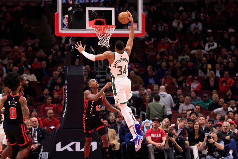 CHICAGO, ILLINOIS - NOVEMBER 30: Giannis Antetokounmpo #34 of the Milwaukee Bucks dunks the ball during the first half against the Chicago Bulls at the United Center on November 30, 2023 in Chicago, Illinois. NOTE TO USER: User expressly acknowledges and agrees that, by downloading and or using this photograph, User is consenting to the terms and conditions of the Getty Images License Agreement. (Photo by Justin Casterline/Getty Images)