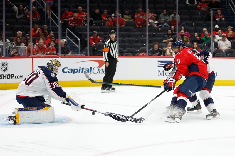 Sep 27, 2024; Washington, District of Columbia, USA; Washington Capitals left wing Alex Ovechkin (8) skates with the puck on Columbus Blue Jackets goaltender Pavel Cajan (30) as Blue Jackets defenseman Jack Johnson (3) defends in the third period at Capital One Arena. Mandatory Credit: Geoff Burke-Imagn Images