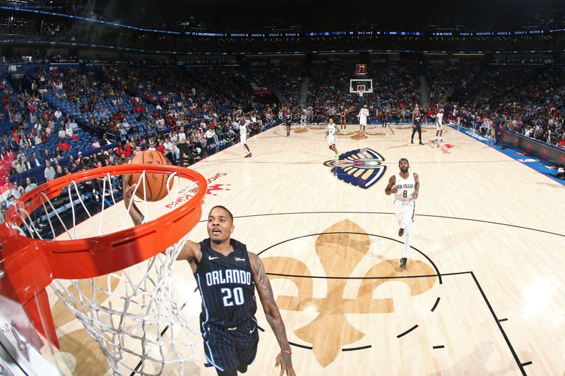 NEW ORLEANS, LA - OCTOBER 10: Markelle Fultz #20 of the Orlando Magic drives to the basket during the game against the New Orleans Pelicans on October 10, 2023 at the Smoothie King Center in New Orleans, Louisiana. NOTE TO USER: User expressly acknowledges and agrees that, by downloading and or using this Photograph, user is consenting to the terms and conditions of the Getty Images License Agreement. Mandatory Copyright Notice: Copyright 2023 NBAE (Photo by Layne Murdoch Jr./NBAE via Getty Images)
