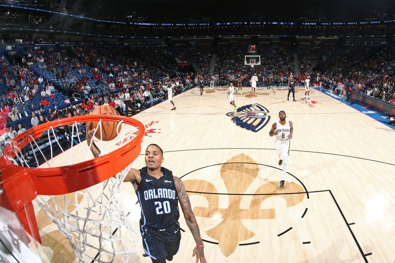 NEW ORLEANS, LA - OCTOBER 10: Markelle Fultz #20 of the Orlando Magic drives to the basket during the game against the New Orleans Pelicans on October 10, 2023 at the Smoothie King Center in New Orleans, Louisiana. NOTE TO USER: User expressly acknowledges and agrees that, by downloading and or using this Photograph, user is consenting to the terms and conditions of the Getty Images License Agreement. Mandatory Copyright Notice: Copyright 2023 NBAE (Photo by Layne Murdoch Jr./NBAE via Getty Images)