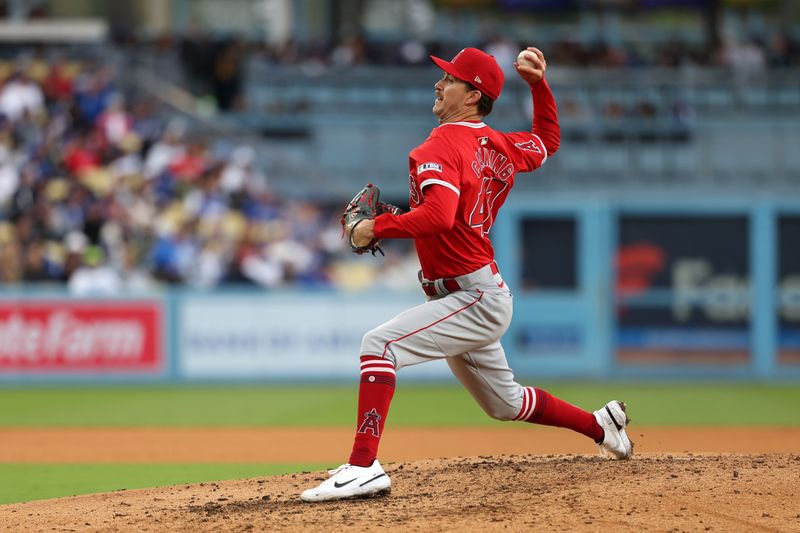 Mar 24, 2024; Los Angeles, California, USA;  Los Angeles Angels starting pitcher Griffin Canning (47) pitches during the fifth inning against the Los Angeles Dodgers at Dodger Stadium. Mandatory Credit: Kiyoshi Mio-USA TODAY Sports