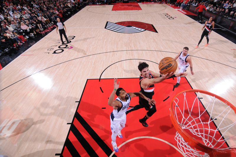 PORTLAND, OR - DECEMBER 1: Deni Avdija #8 of the Portland Trail Blazers drives to the basket during the game against the Dallas Mavericks on December 1, 2024 at the Moda Center Arena in Portland, Oregon. NOTE TO USER: User expressly acknowledges and agrees that, by downloading and or using this photograph, user is consenting to the terms and conditions of the Getty Images License Agreement. Mandatory Copyright Notice: Copyright 2024 NBAE (Photo by Cameron Browne/NBAE via Getty Images)