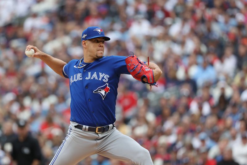 Oct 4, 2023; Minneapolis, Minnesota, USA; Toronto Blue Jays starting pitcher Jose Berrios (17) delivers a pitch in the first inning against the Minnesota Twins during game two of the Wildcard series for the 2023 MLB playoffs at Target Field. Mandatory Credit: Jesse Johnson-USA TODAY Sports