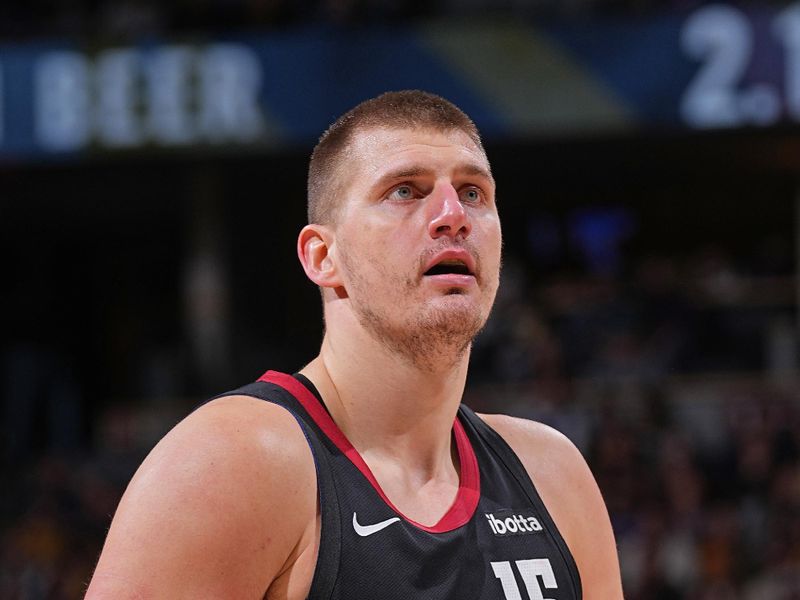 DENVER, CO - JANUARY 27: Nikola Jokic #15 of the Denver Nuggets prepares to shoot a free throw against the Philadelphia 76ers on January 27, 2024 at the Ball Arena in Denver, Colorado. NOTE TO USER: User expressly acknowledges and agrees that, by downloading and/or using this Photograph, user is consenting to the terms and conditions of the Getty Images License Agreement. Mandatory Copyright Notice: Copyright 2024 NBAE (Photo by Bart Young/NBAE via Getty Images)