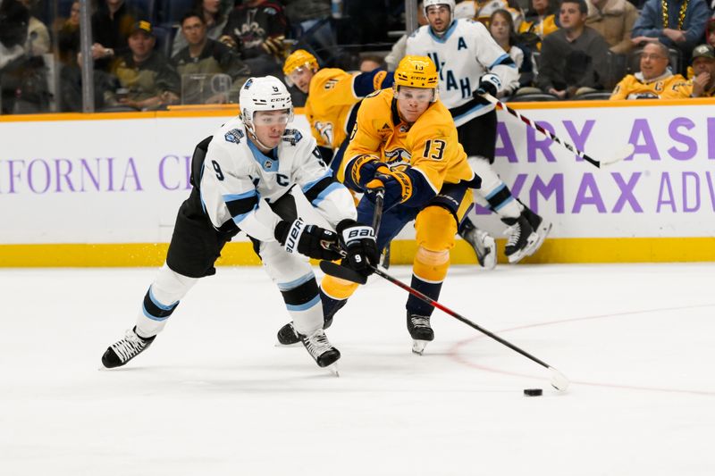 Nov 9, 2024; Nashville, Tennessee, USA;  Nashville Predators center Juuso Parssinen (13) and Utah Hockey Club center Clayton Keller (9) fight for the puck during the third period at Bridgestone Arena. Mandatory Credit: Steve Roberts-Imagn Images