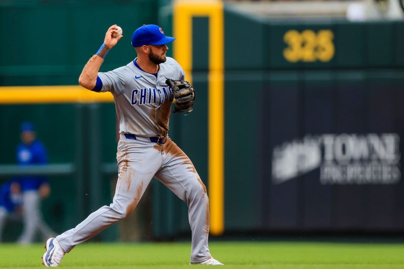 Jun 8, 2024; Cincinnati, Ohio, USA; Chicago Cubs second baseman David Bote (13) throws to first to get Cincinnati Reds outfielder Jake Fraley (not pictured) out in the second inning at Great American Ball Park. Mandatory Credit: Katie Stratman-USA TODAY Sports