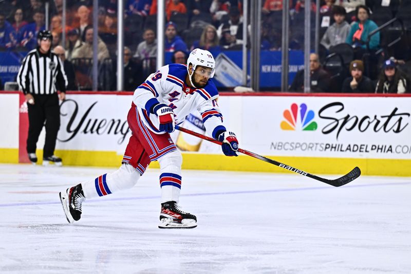 Feb 24, 2024; Philadelphia, Pennsylvania, USA; New York Rangers defenseman K'Andre Miller (79) shoots against the Philadelphia Flyers in the second period at Wells Fargo Center. Mandatory Credit: Kyle Ross-USA TODAY Sports