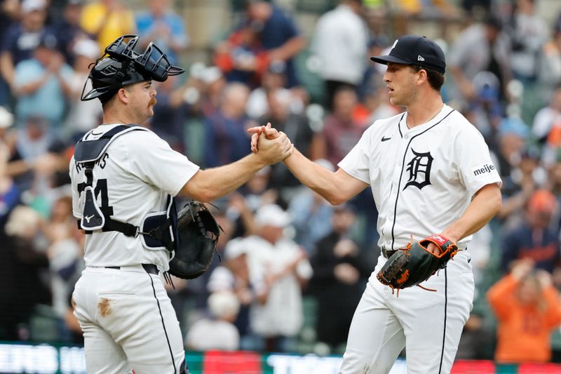 Sep 24, 2024; Detroit, Michigan, USA;  Detroit Tigers catcher Jake Rogers (34) and relief pitcher Beau Brieske (4) celebrate after defeating the Tampa Bay Rays at Comerica Park. Mandatory Credit: Rick Osentoski-Imagn Images