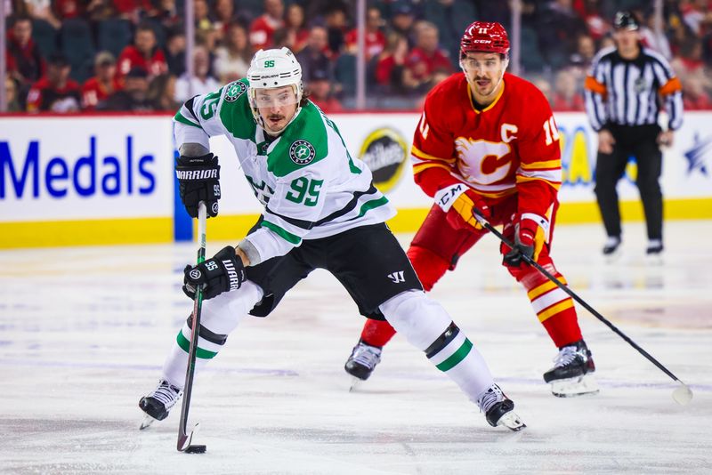 Nov 30, 2023; Calgary, Alberta, CAN; Dallas Stars center Matt Duchene (95) controls the puck against the Calgary Flames during the first period at Scotiabank Saddledome. Mandatory Credit: Sergei Belski-USA TODAY Sports