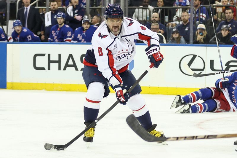 Oct 12, 2025; New York, New York, USA;  Washington Capitals left wing Alex Ovechkin (8) attempts a shot on goal in the third period against the New York Rangers at Madison Square Garden. Mandatory Credit: Wendell Cruz-Imagn Images