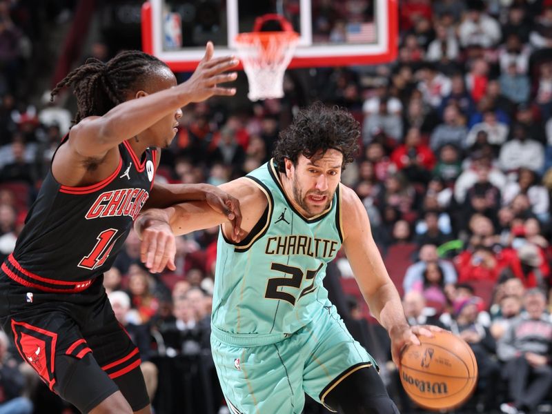 CHICAGO, IL - DECEMBER 13: Vasilije Micic #22 of the Charlotte Hornets  dribbles the ball during the game against the Chicago Bulls on December 13, 2024 at United Center in Chicago, Illinois. NOTE TO USER: User expressly acknowledges and agrees that, by downloading and or using this photograph, User is consenting to the terms and conditions of the Getty Images License Agreement. Mandatory Copyright Notice: Copyright 2024 NBAE (Photo by Jeff Haynes/NBAE via Getty Images)