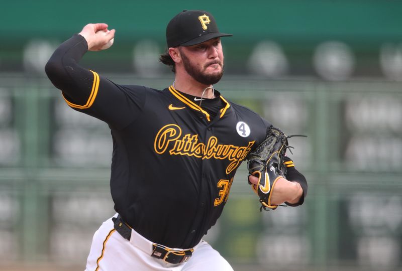 Jun 3, 2025; Pittsburgh, Pennsylvania, USA;  Pittsburgh Pirates starting pitcher Paul Skenes (30) delivers a pitch against the Houston Astros during the first inning at PNC Park. Mandatory Credit: Charles LeClaire-Imagn Images