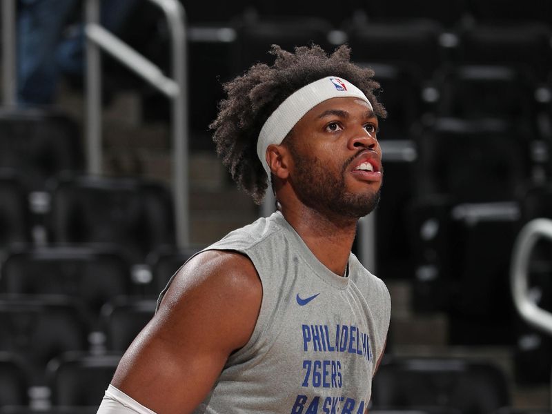 MILWAUKEE, WI - MARCH 14: Buddy Hield #17 of the Philadelphia 76ers warms up before the game against the Milwaukee Bucks on March 14, 2024 at the Fiserv Forum Center in Milwaukee, Wisconsin. NOTE TO USER: User expressly acknowledges and agrees that, by downloading and or using this Photograph, user is consenting to the terms and conditions of the Getty Images License Agreement. Mandatory Copyright Notice: Copyright 2024 NBAE (Photo by Gary Dineen/NBAE via Getty Images).