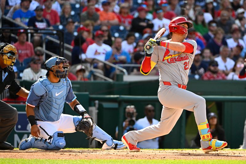 May 10, 2025; Washington, District of Columbia, USA; Washington Nationals relief pitcher Jorge Lopez (21) hits a two RBI double against the Washington Nationals during the second inning at Nationals Park. Mandatory Credit: Brad Mills-Imagn Images