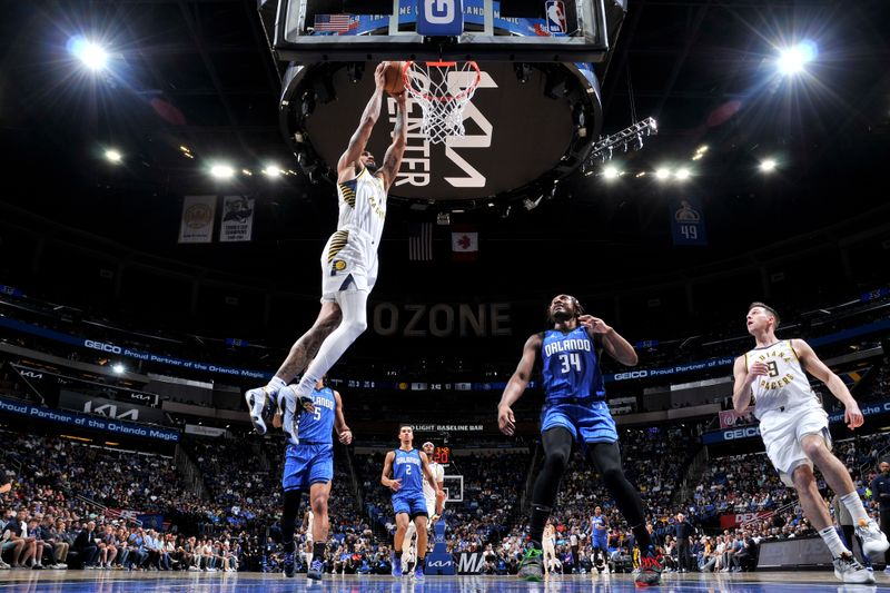 ORLANDO, FL - MARCH 10: Obi Toppin #1 of the Indiana Pacers goes to the basket during the game on March 10, 2024 at Amway Center in Orlando, Florida. NOTE TO USER: User expressly acknowledges and agrees that, by downloading and or using this photograph, User is consenting to the terms and conditions of the Getty Images License Agreement. Mandatory Copyright Notice: Copyright 2024 NBAE (Photo by Fernando Medina/NBAE via Getty Images)